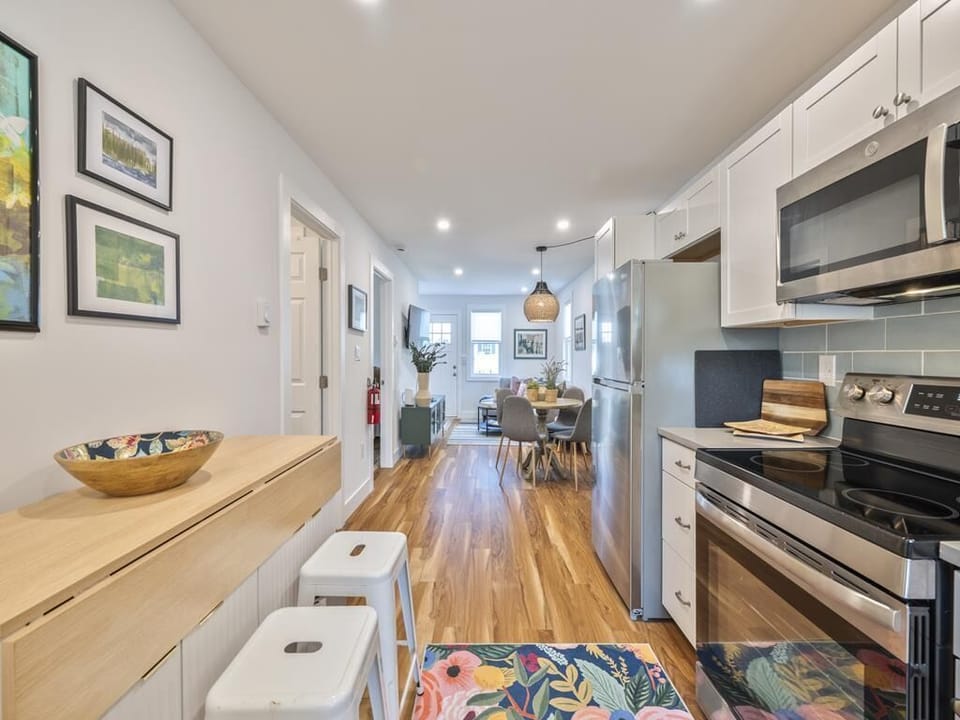 Open kitchen and dining area for gatherings.
