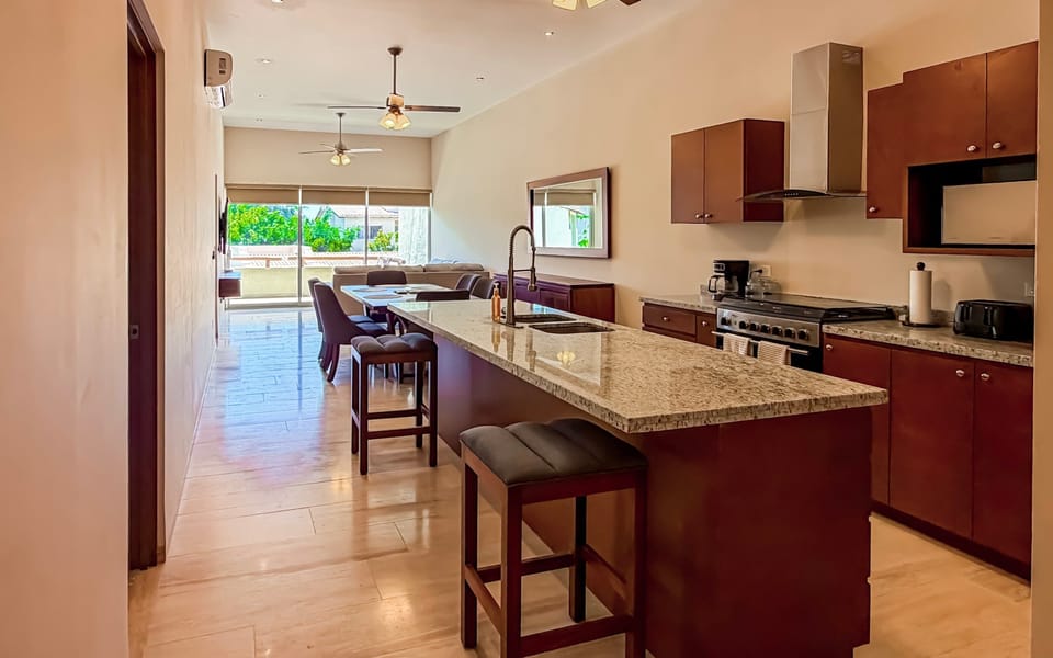 Modern kitchen and dining layout makes entertaining easy.