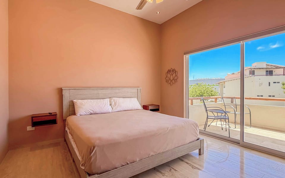Wake up to beautiful views from this bright and airy bedroom.