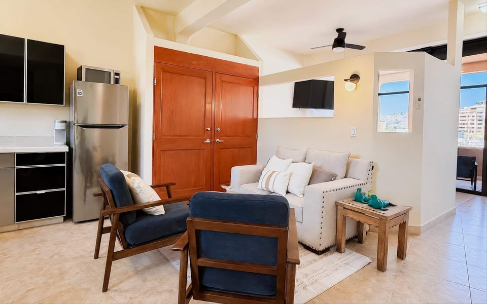 Relaxed seating area that flows to the bedroom area.