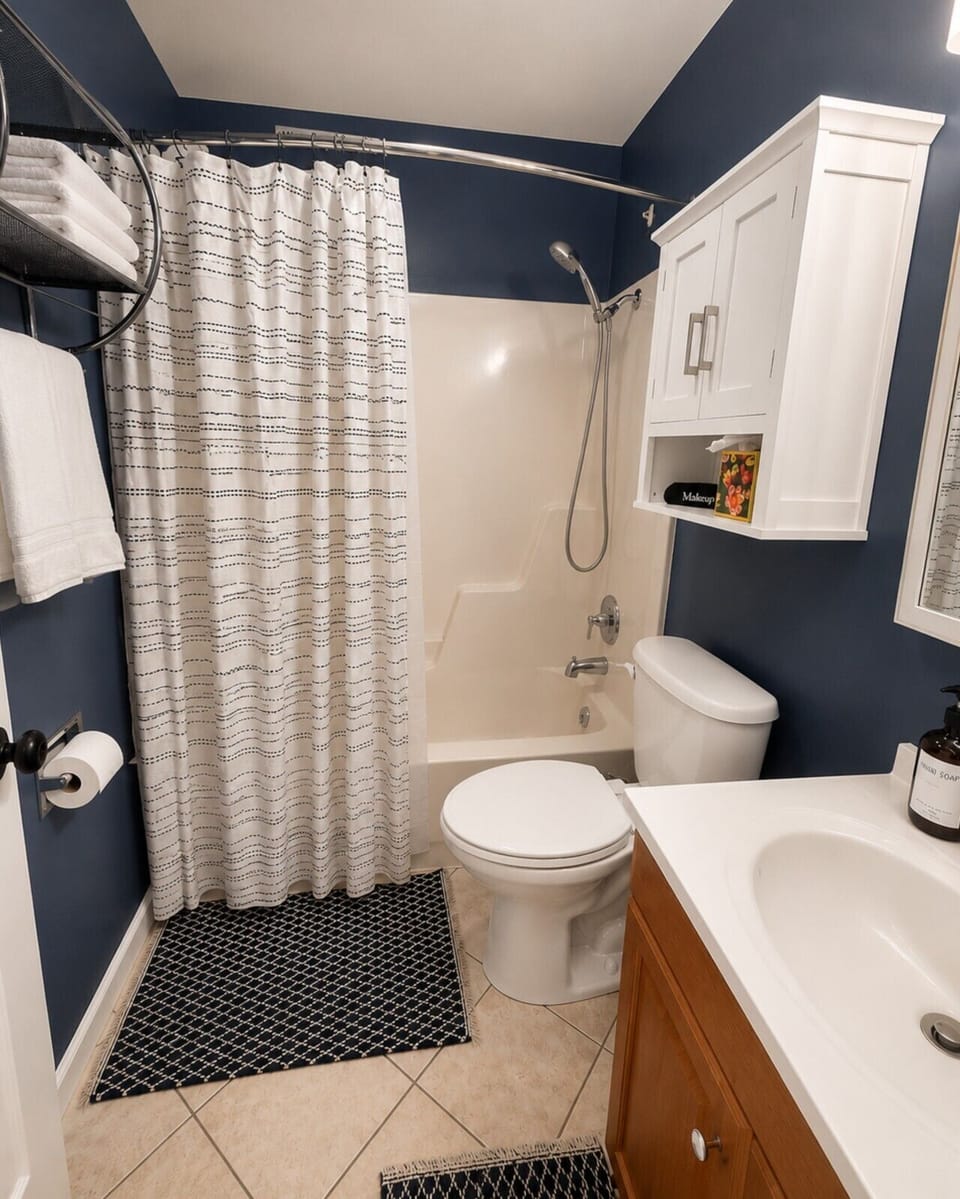 A clean, stylish full bathroom with everything you need to refresh and recharge between adventures on the lake.