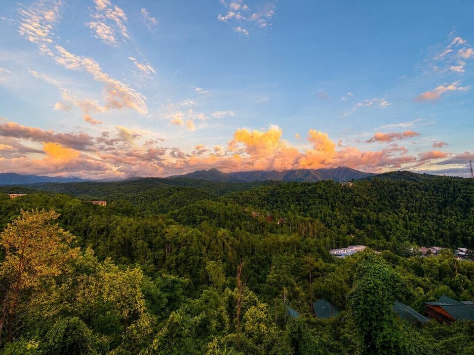 Panoramic Smoky Mountain views from Views Forever, a luxury Gatlinburg cabin close to downtown attractions.