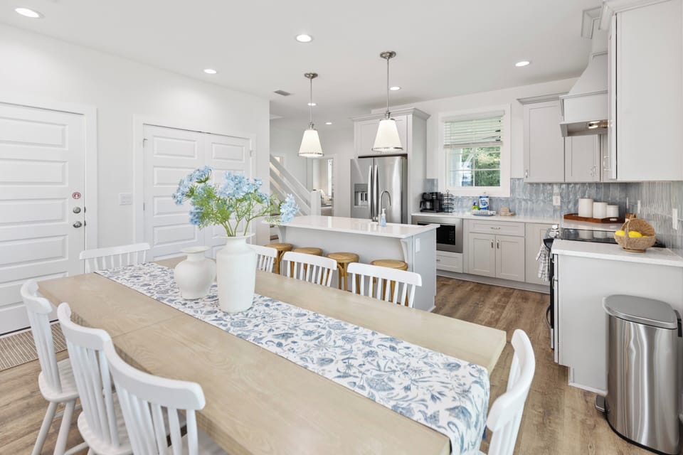 Picture yourself cooking with loved ones in this bright, open kitchen and dining space.