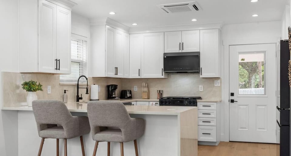 A gas range, coffee maker, and all the cookware you need make it easy to skip the restaurant lines.