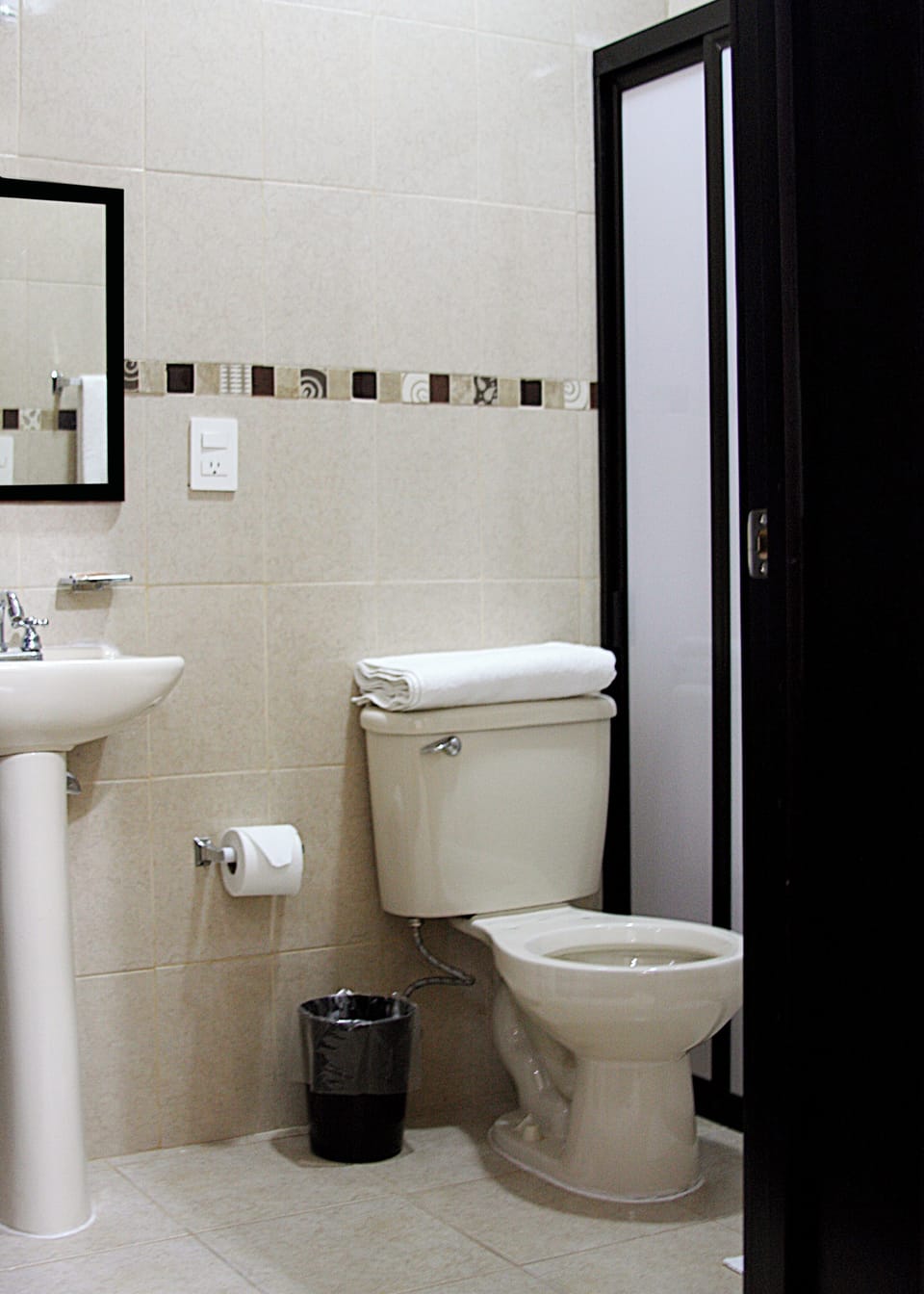 Shower, towels, soap, toilet paper