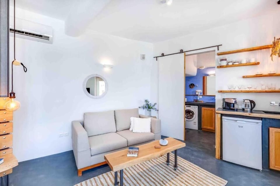 Classic Studio, Patio, Sea View | Living area | 40-inch Smart TV with satellite channels, Netflix, streaming services