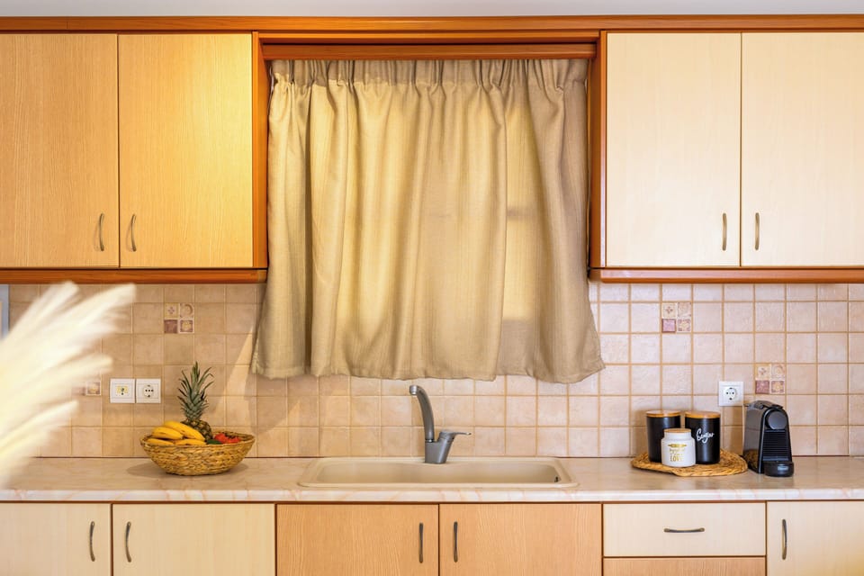 Deluxe Apartment | Private kitchen | Full-size fridge, stovetop, espresso maker, electric kettle