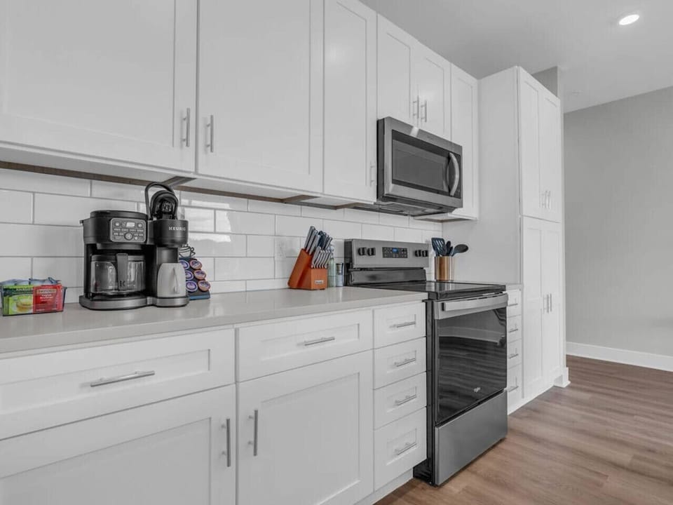 Kitchen: Whip up unforgettable meals in this stylish kitchen with modern amenities and sleek design!