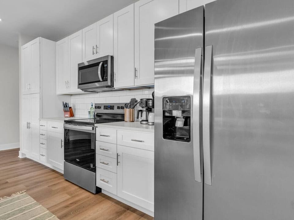 Kitchen Bliss: Modern appliances and stylish decor await your culinary adventures!