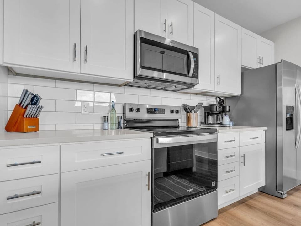 Kitchen Delight: Modern appliances and sleek design invite culinary adventures!