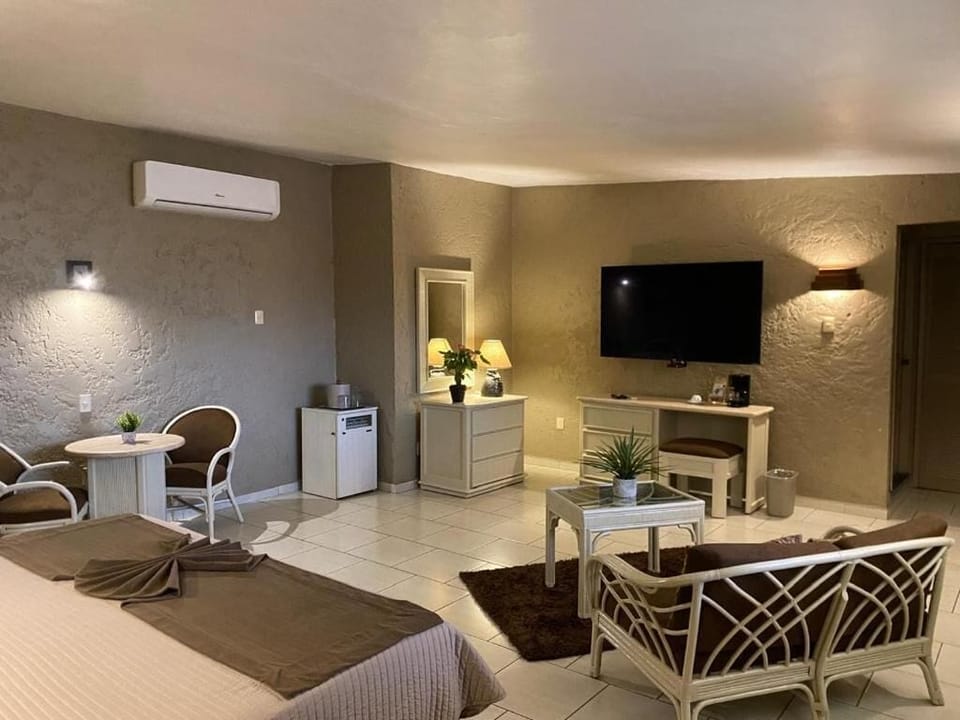 Comfort Suite, Balcony, City View | Laptop workspace, blackout drapes, iron/ironing board, WiFi (free)