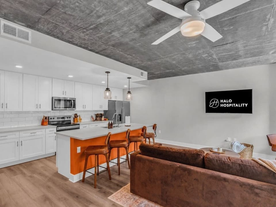 Modern Kitchen: Stylish space with sleek appliances and vibrant accents, perfect for culinary adventures!
