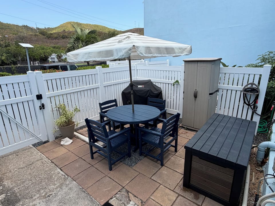 Back patio for easy access in and out of condo from parking lot. Weber Grill!