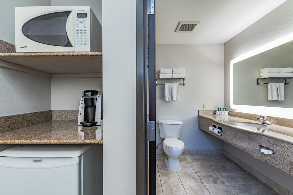 Suite, 2 Queen Beds | Hypo-allergenic bedding available, in-room safe, desk, blackout drapes