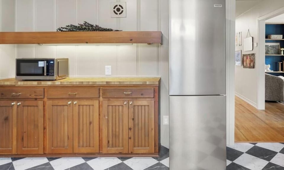 Full-size fridge and microwave keep snacks and leftovers within reach. Plenty of storage for a longer stay.