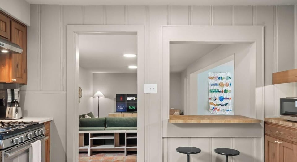 The kitchen opens to the media room so you can cook and chat. Smart TV with streaming keeps everyone close.