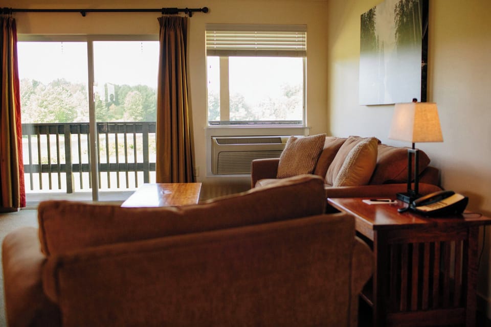 Suite, Living quarters, 1 King Bed with Sofabed, Non Smoking, Balcony | Living area