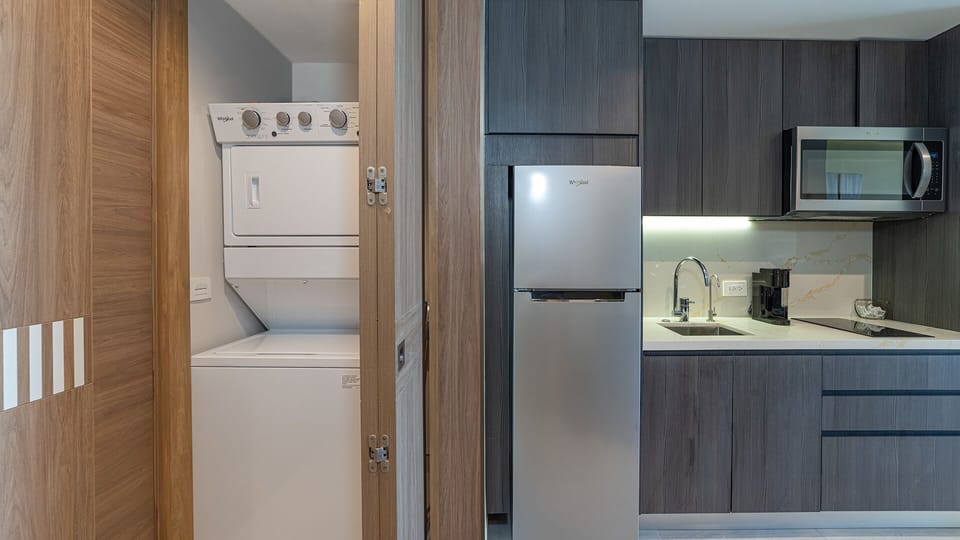 Washer dryer, refrigerator, stove and microwave.