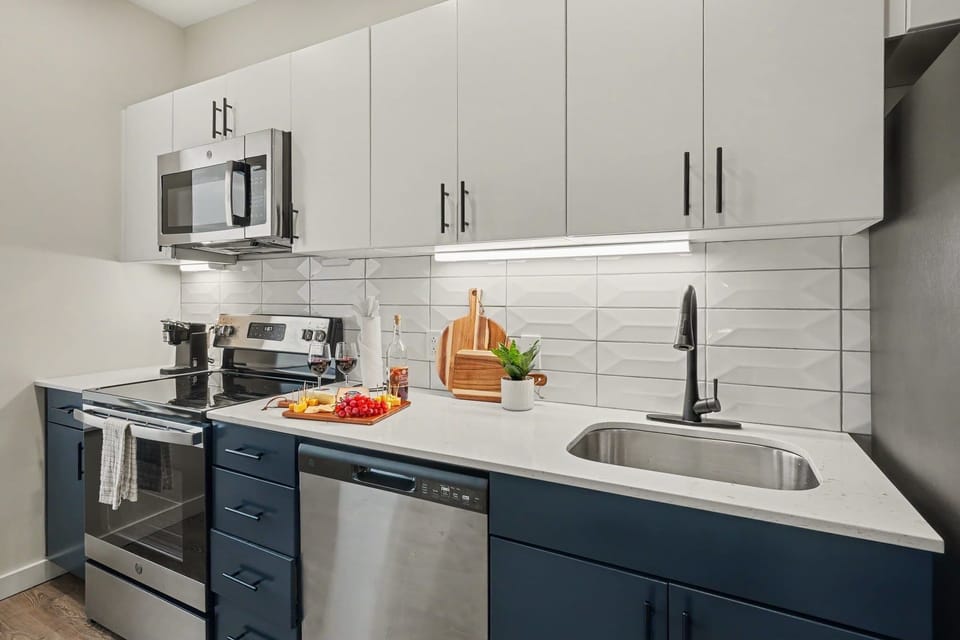 Kitchen featuring sleek stainless steel appliances and everything needed to prepare meals, snacks, or your morning coffee with ease.