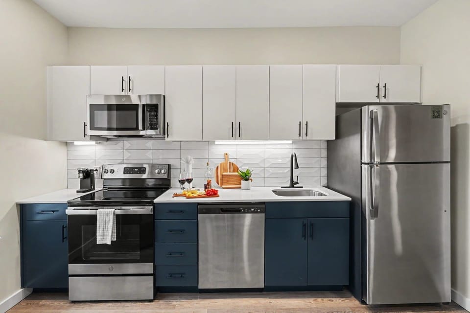 Kitchen featuring sleek stainless steel appliances and everything needed to prepare meals, snacks, or your morning coffee with ease.
