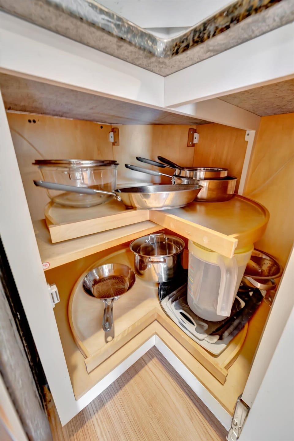 Kitchen stocked with cookware and utensils