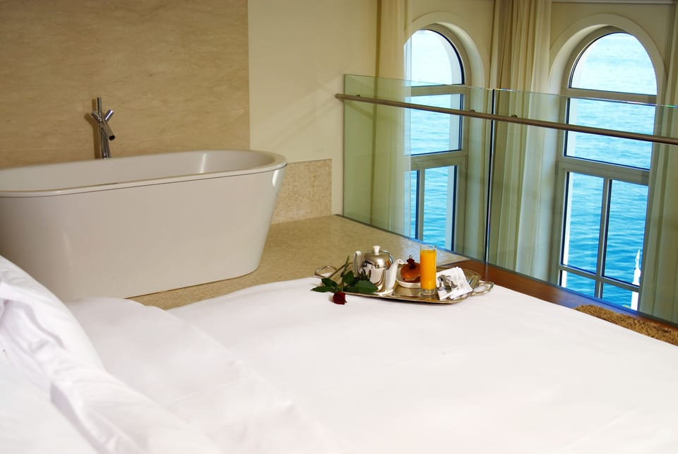Mezzanine Deluxe Suite | Frette Italian sheets, premium bedding, down comforters, pillowtop beds