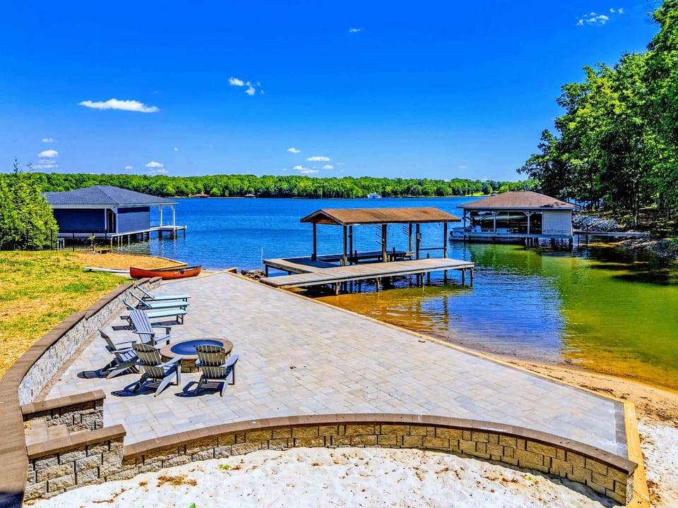 Dock - A covered boat lift and tie-up space put the whole lake within easy reach of the house.