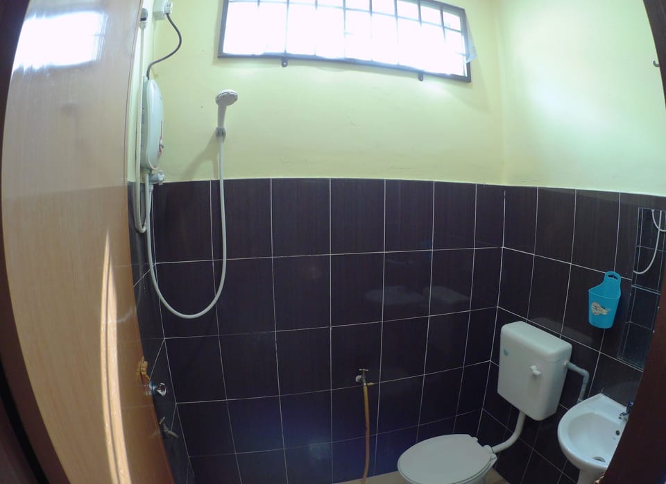 Shower, free toiletries, slippers, towels