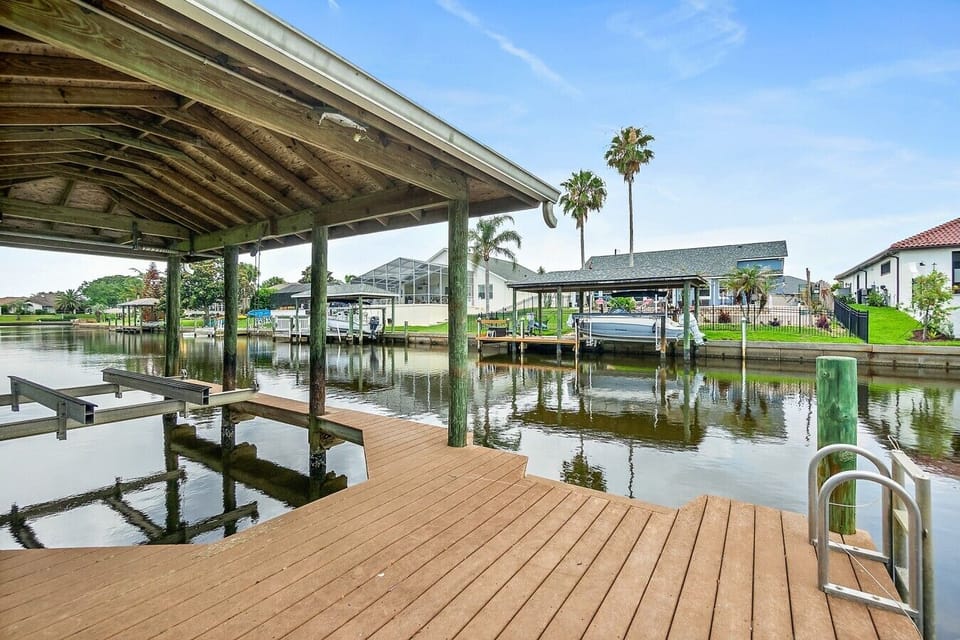 Private dock and covered boat lift make it easy to keep your boat on-site throughout your stay.