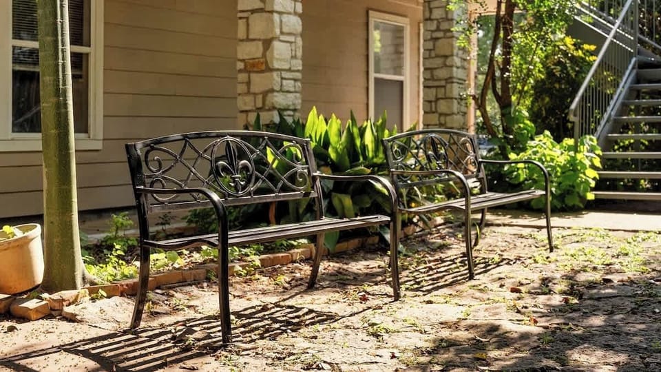 Charming Courtyard Seating Surrounded by Beautiful Trees