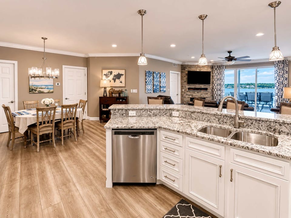 The chic, open kitchen is well equipped for an unforgettable getaway​