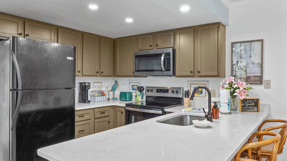 The kitchen comes stocked with a full coffee bar, 5 days’ worth of soap and other house essentials, and plenty of counter space to get snacks and drinks prepped and ready to go!