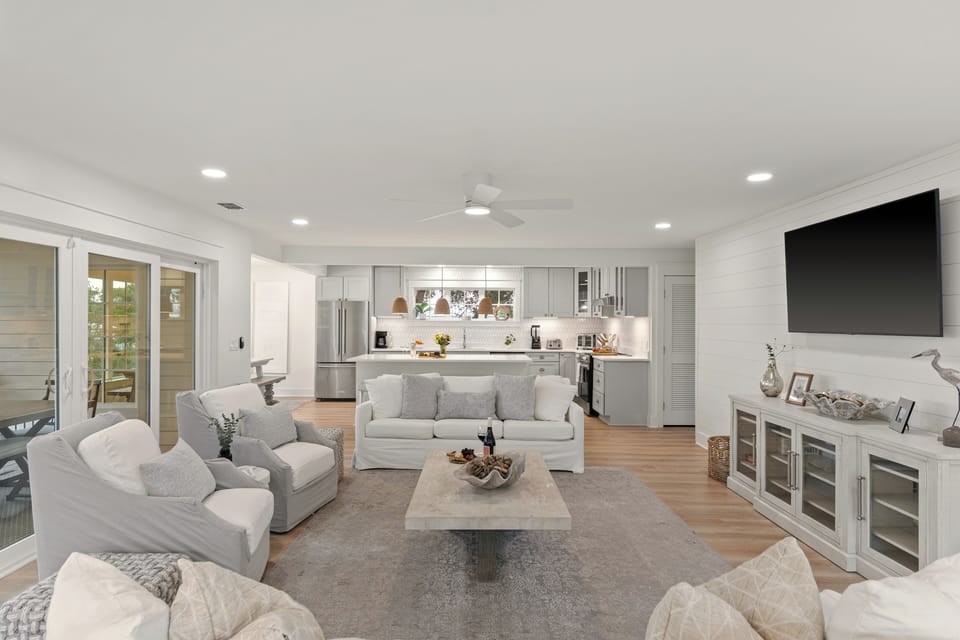 Flooded with natural light, this multi-functional great room handles large groups with ease.