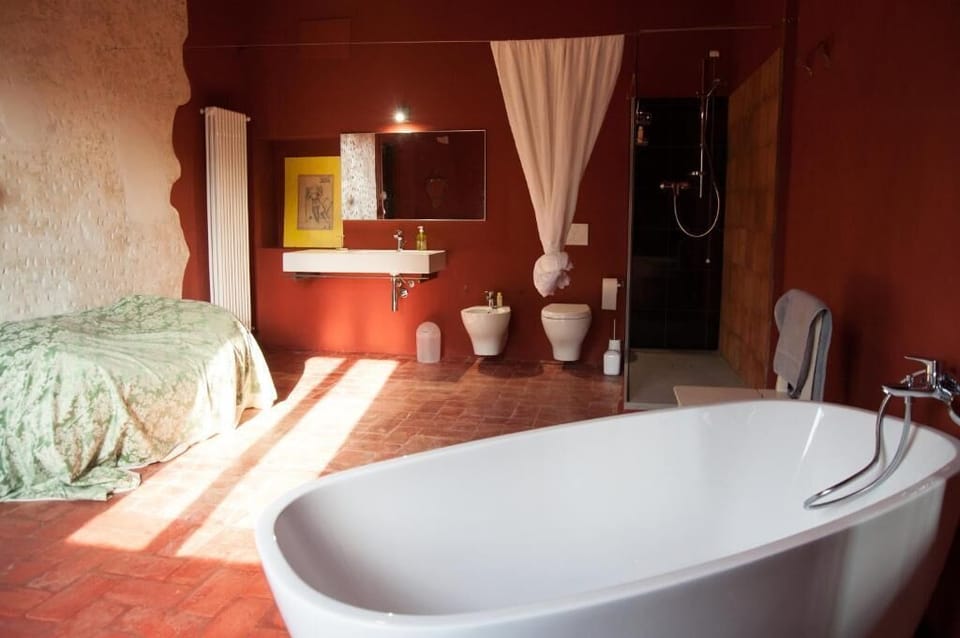 Separate tub and shower, hair dryer, towels, soap