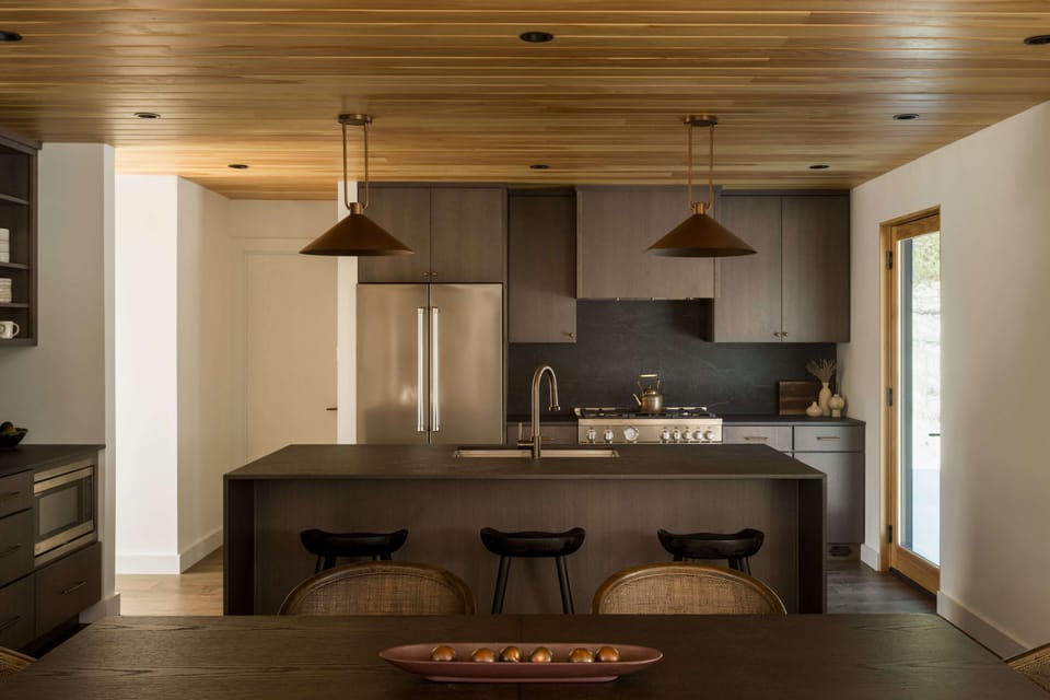 Our kitchen comes stocked with Bertazonni appliances as well as a breakfast bar/kitchen island, making hosting a breeze!
"Select photography by Ryan Bent Photography"