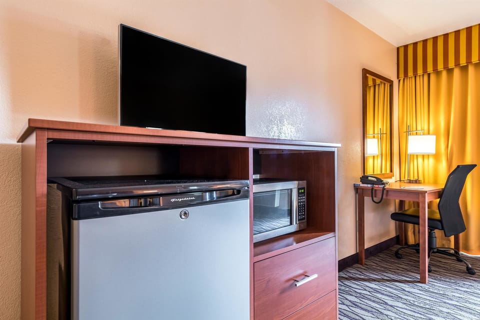 Blackout drapes, iron/ironing board, rollaway beds, free WiFi