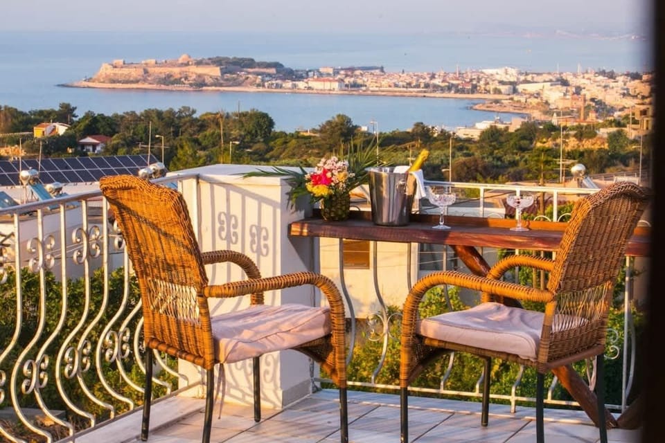Balcony chairs facing the sea