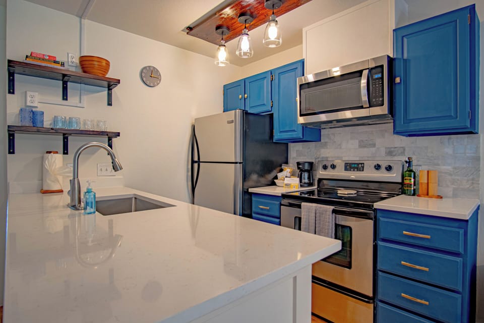 Spacious Kitchen with quart countertops
