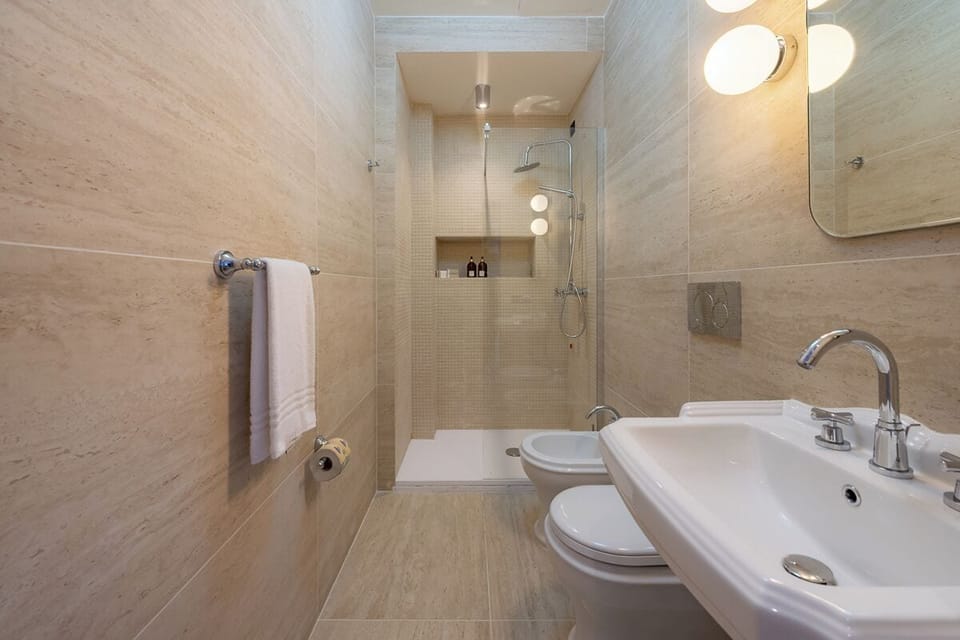 City Double Room, Balcony, City View | Bathroom | Shower, hair dryer, towels, soap