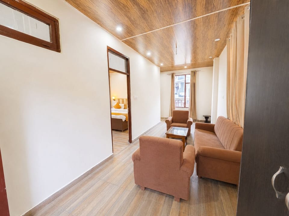 Family Suite, Balcony, Mountain View | Living area | 7-inch LED TV with satellite channels