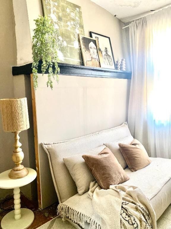 Family Quadruple Room, Courtyard View | Living area