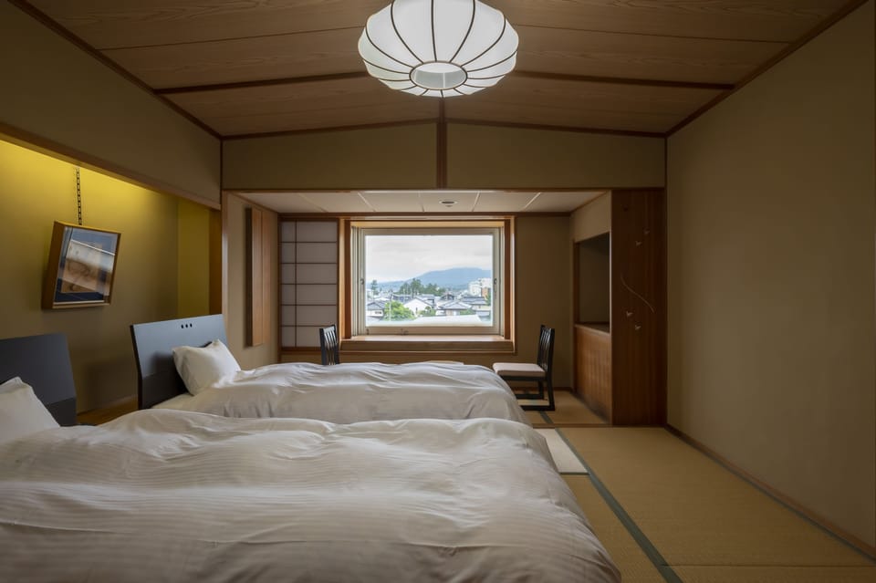 Twin Room, Non Smoking | Desk, laptop workspace, iron/ironing board (on request), WiFi (free)
