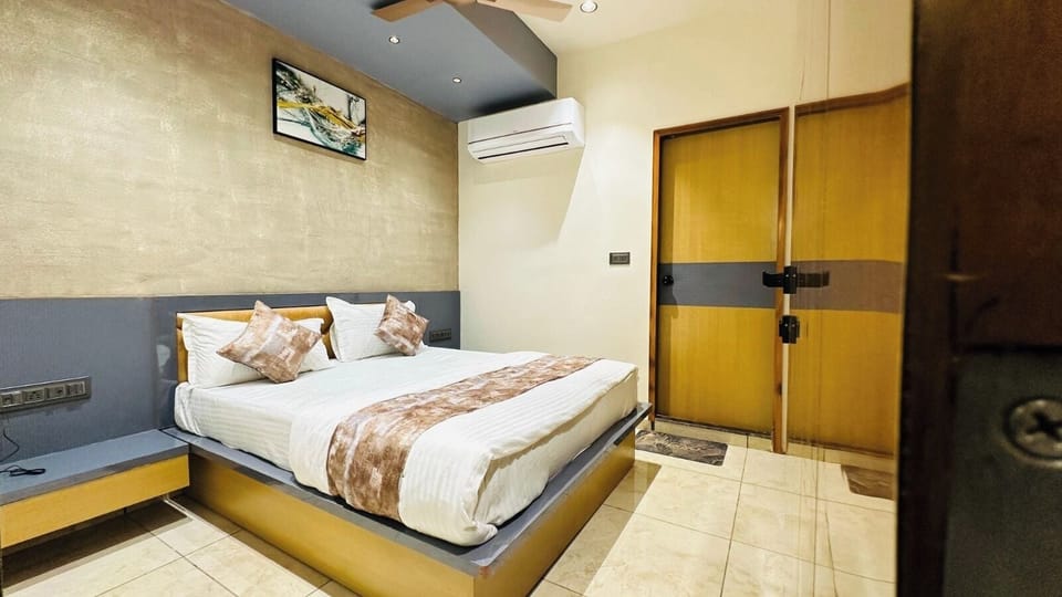 Deluxe Double Room, City View | In-room safe, desk, laptop workspace, iron/ironing board