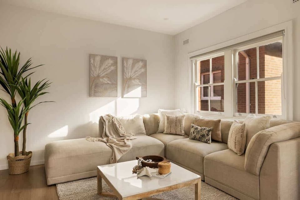 Living Room: Sun-soaked retreat with stylish decor and plush seating for perfect relaxation!