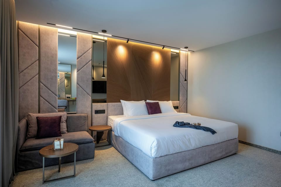 Deluxe Triple Room, Balcony, Partial Sea View | Minibar, desk, WiFi (free)