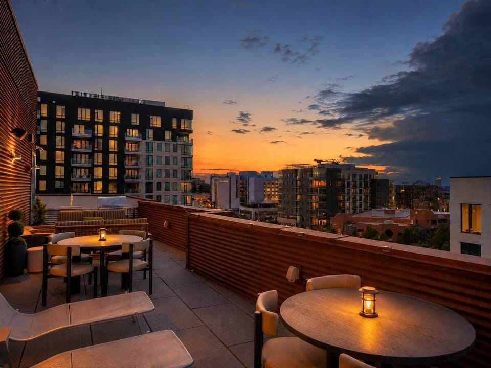 Beautiful rooftop with tons of seating, loungers, and grill!