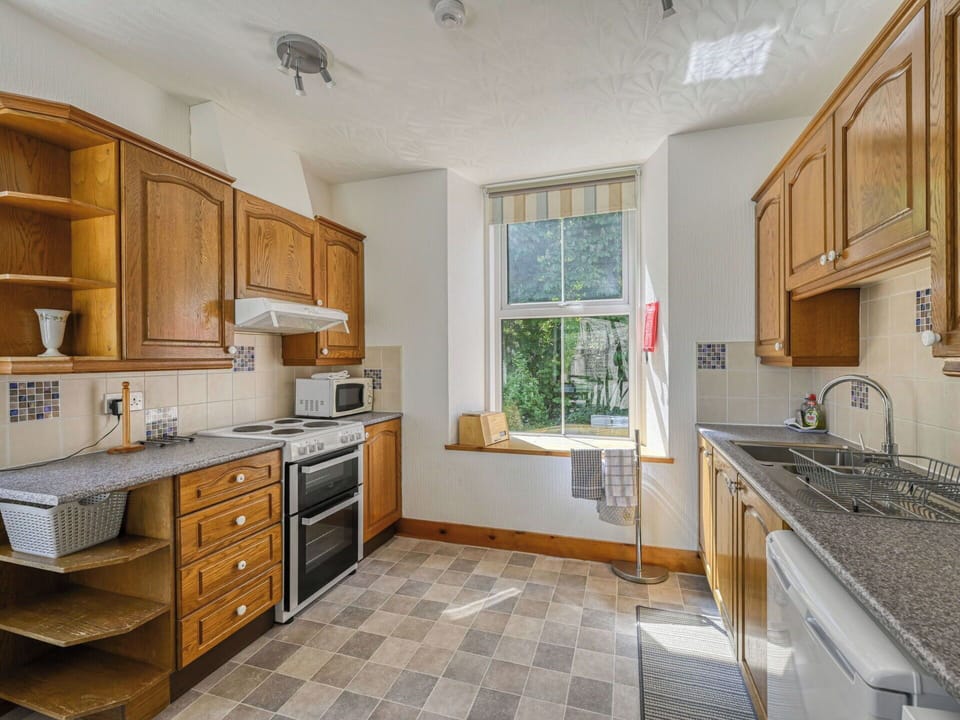 Kitchen, Countertop, Major Appliance, Kitchen Appliance, Wood, Flooring, Cabinetry, Furniture, Interior Design, Floor