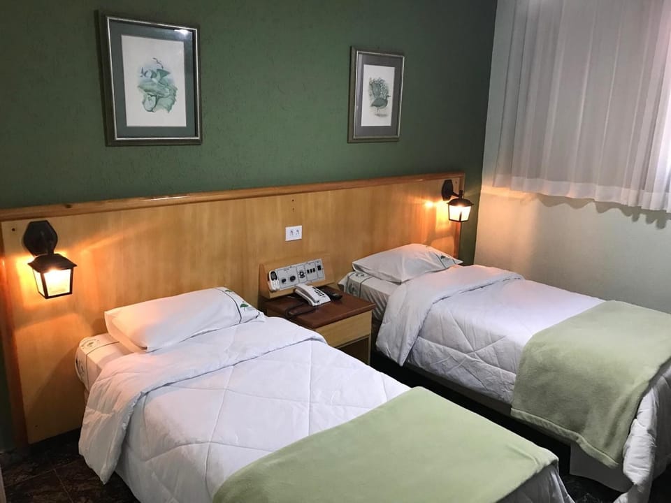 Minibar, desk, blackout drapes, iron/ironing board