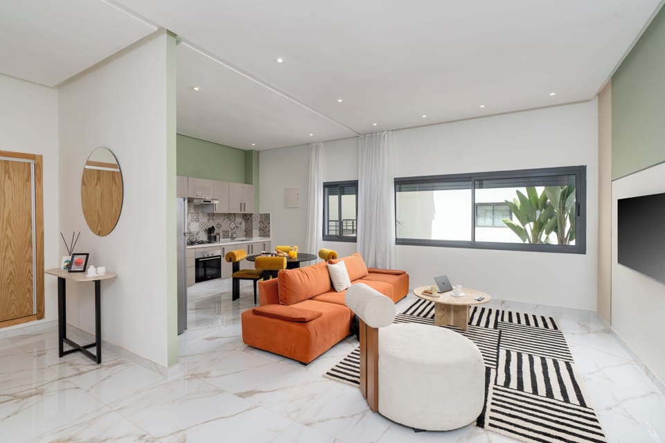 Apartment, City View | Living area | 121-cm Smart TV with digital channels, pay movies