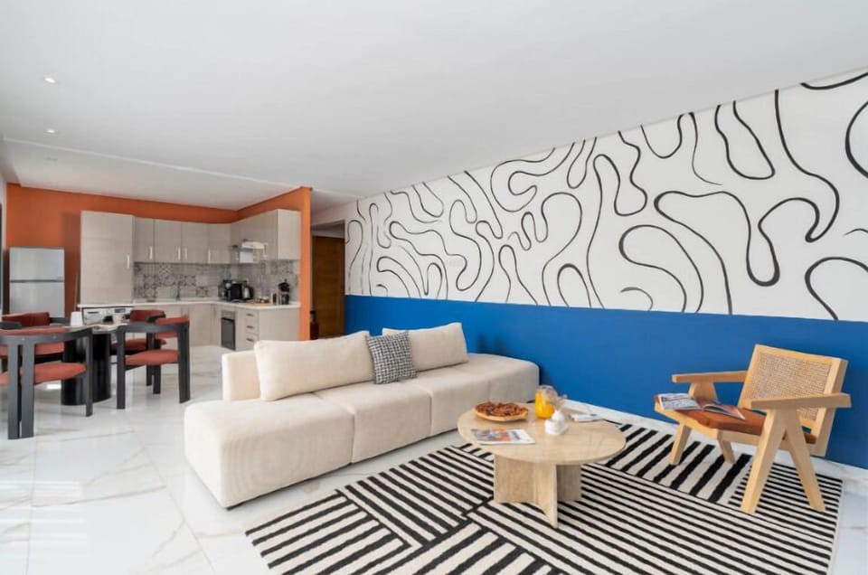 Apartment, City View | Living area | 121-cm Smart TV with digital channels, pay movies